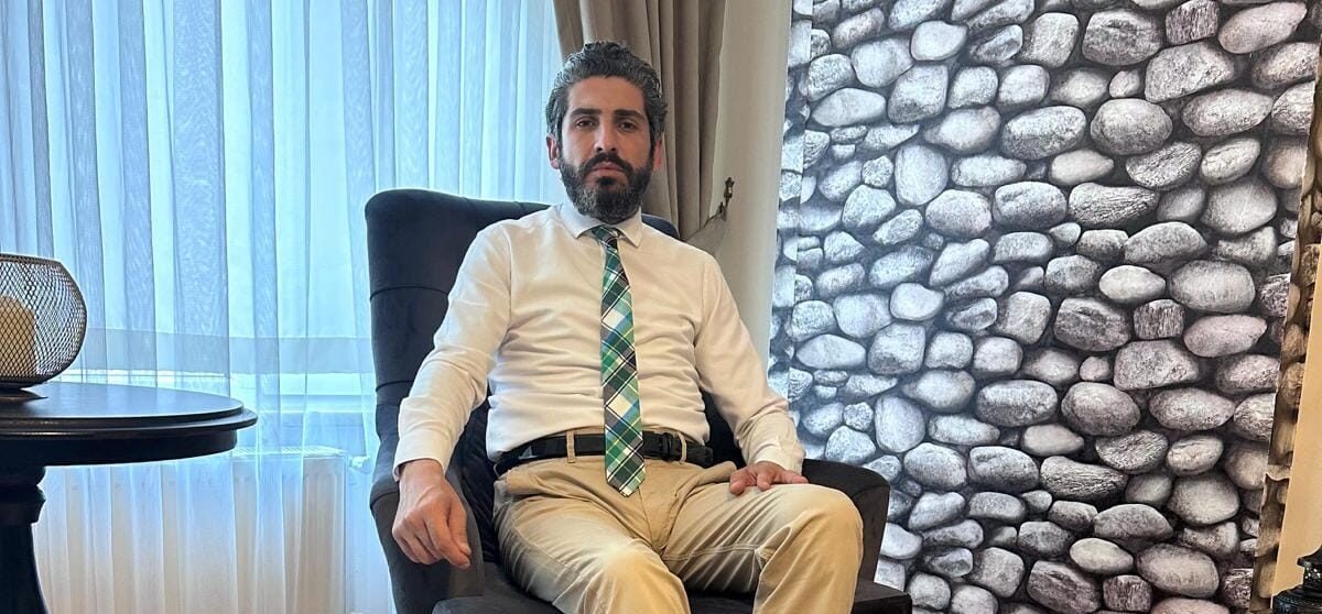 Ercüment Tula Kimdir.