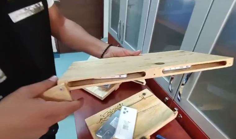 Akılalmaz yöntem: Kargo ile gönderilen rahlelerden ‘kaçak telefon’ çıktı