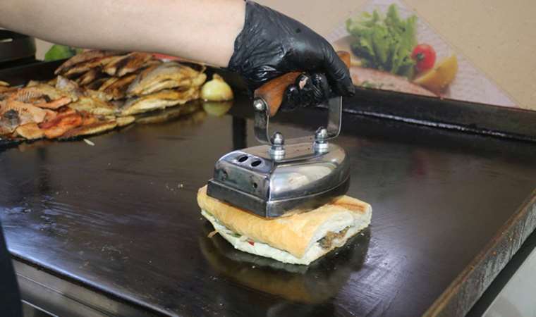 Sivas’ta bir balık restoranı balığı ütü ile pişiriyor!